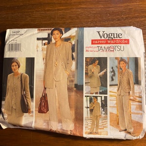 May include: A sewing pattern for a career wardrobe, featuring a beige blazer, trousers, and skirt. The pattern is from Vogue and is designed by Tamotsu. The pattern number is 1437 and the size is 10-12.