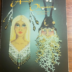 May include: Amulet Obsession book cover featuring beaded purse patterns. The cover displays two beaded amulet designs: a blonde woman and a wizard. The book's title is in gold script, with the author's name at the bottom.
