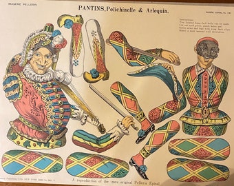 May include: A vintage paper doll set featuring Polichinelle and Arlequin. The dolls are dressed in colourful, patterned costumes with swords and hats. The image is a reproduction of a rare original Pellerin Epinal.