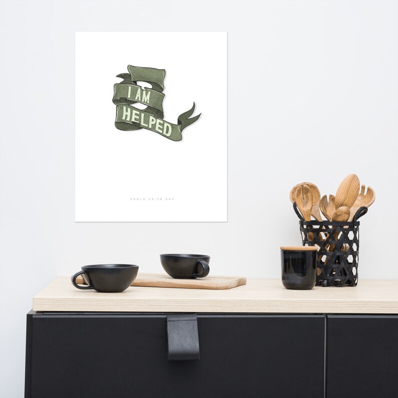 May include: A white printable poster with a green banner that says "I AM HELPED".