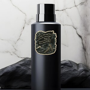 May include: A black water bottle with a silver cap. The bottle features a sticker with a pirate-themed design, including a black flag, skeleton hands, and the text "Yo Ho, All together, Hoist the colours high, Heave Ho, Thieves and Beggars Never Shall We Die!"