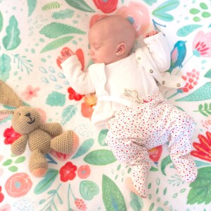 Baby on Floral Blanket
