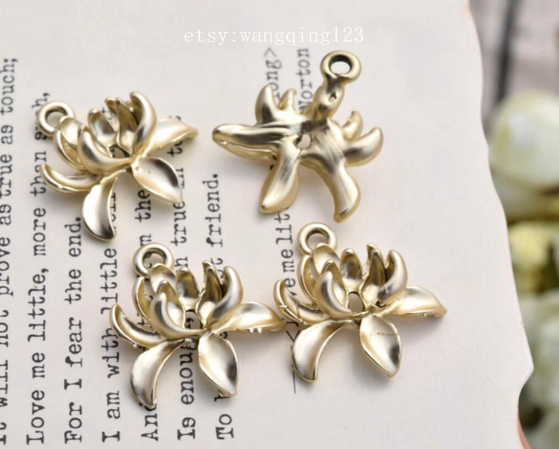 4 matte gold brass lotus charms charm pendants Etsy