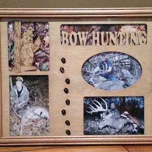 May include: A wooden frame with a cutout of the words "BOW HUNTING" and four photos of deer hunting. The photos show a hunter with a deer, a hunter in the woods, and a deer in the woods.
