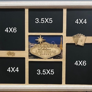 May include: A wooden picture frame with a black chalkboard background. The frame has eight openings for photos, each with a different size. The frame is decorated with a wooden sign that says "Welcome to Fabulous Las Vegas, Nevada".
