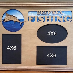 May include: A wooden picture frame with a cutout of a marlin fish and the words "DEEP SEA FISHING". The frame has three 4x6 inch openings for photos.