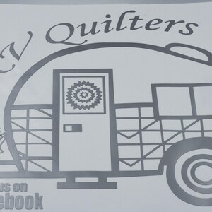 May include: Black and white illustration of an RV with the text "RV Quilters" above it. The RV has a door, a window, and a patterned design. The text "Find us on Facebook" is below the RV.