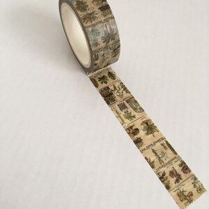 May include: A roll of decorative washi tape featuring a botanical print with various plant illustrations in shades of green, brown, and beige. The tape is unrolled, revealing the repeating pattern. Perfect for scrapbooking and crafts.