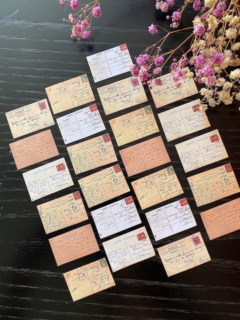 May include: A collection of vintage postcards with handwritten messages and stamps. The postcards are in various shades of brown and cream with black ink. The text on the postcards reads "CARTE POSTALE" and "Jard".