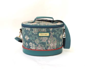 Vintage American Tourister reiskoffer, groene tapijtstof, cosmeticakoffer