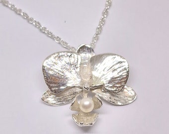 Orchid pendant, hand made from Sterling Silver, with an 18 inch Sterling silver chain