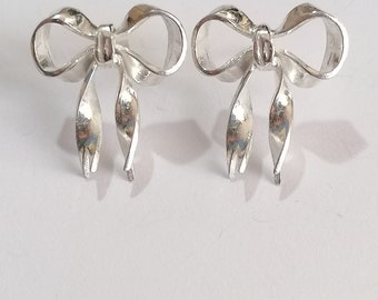 Bow studs hand made from Sterling Silver