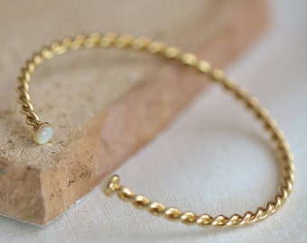 Bracelet Jonc ajustable Laura doré à l'or fin 24 carats et cristal noir