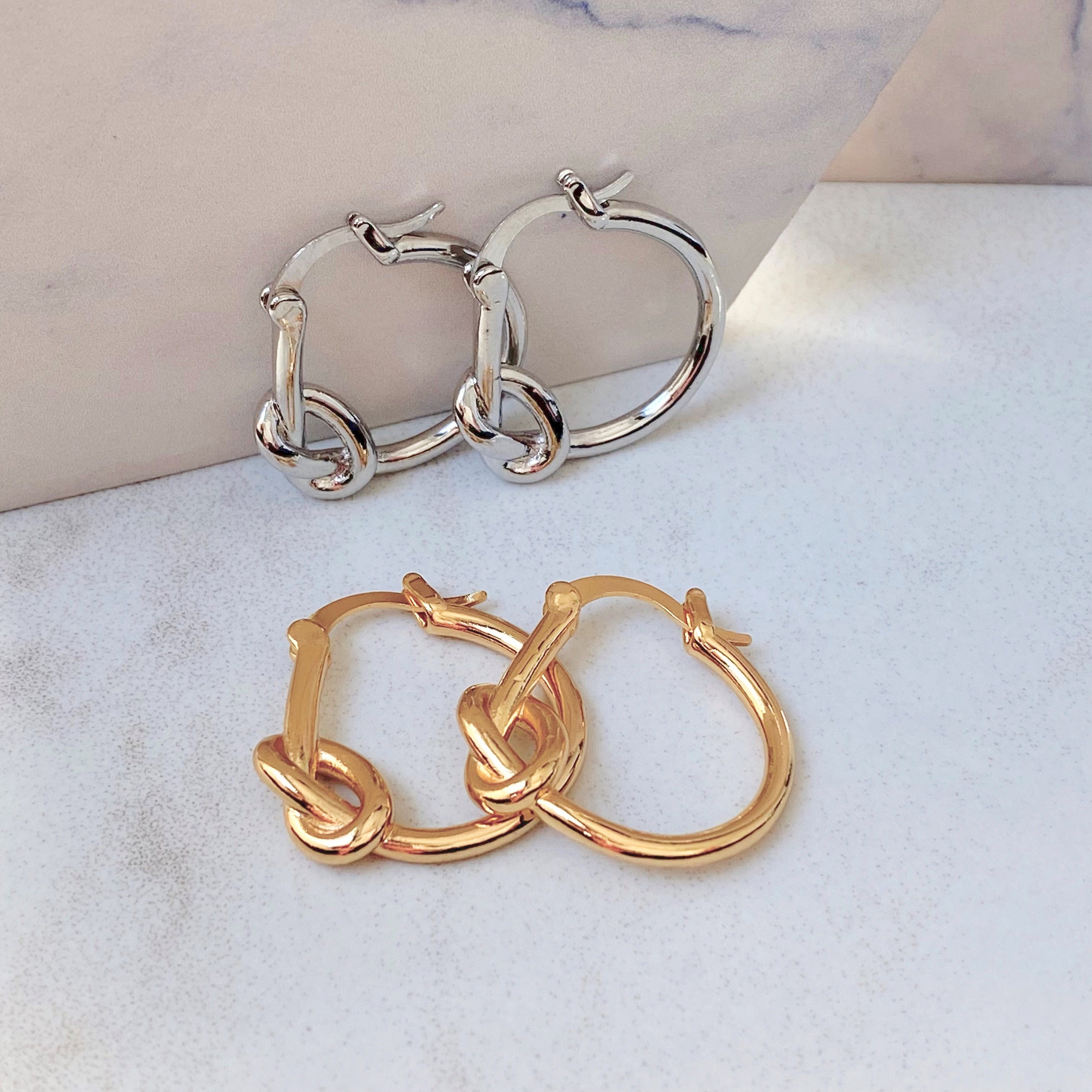 Celine knot hoop earrings deals