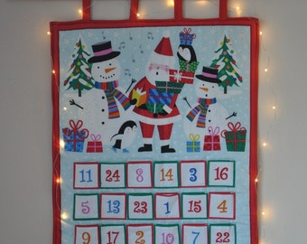 Santa Snowman advent calendar with pockets. RTS