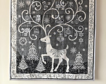 Modern Christmas Scandi advent calendar with pockets. Silver scandi reindeer. Reusable, from panel.