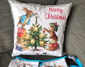 Peter Rabbit and family Christmas cushion