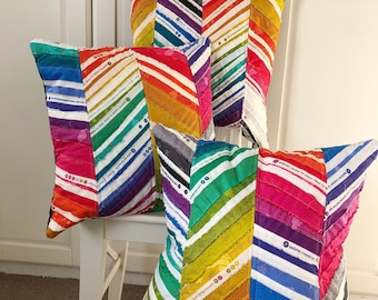 Rainbow fabric cushion covers made from selvages - Alison Glass fabric