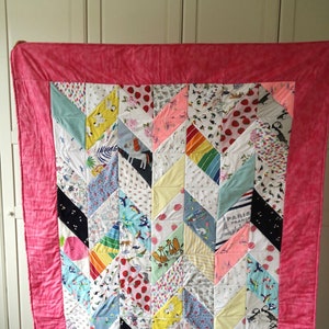 Bespoke chevron Memory quilt keepsake blanket. Made from baby clothes.