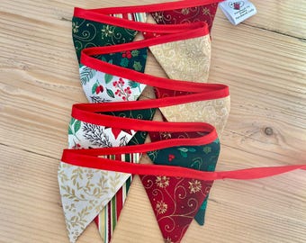Mini Christmas fabric bunting on satin header tape.