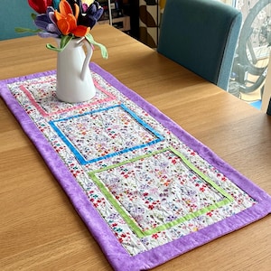 Pink wildflowers quilted table runner. Spring Summer