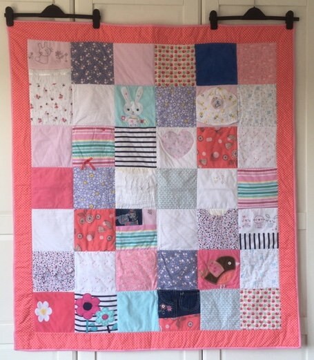 Quilt made out of baby clothes deals