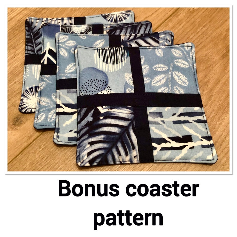 May include: Four blue and black fabric coasters with a geometric pattern. The coasters are stacked on top of each other. Bonus coaster pattern.