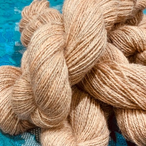 4ply alpaca and silk pale burnt orange yarn, hand dyed using madder.