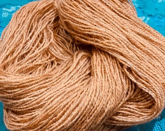 4ply alpaca and silk burnt orange yarn, hand dyed using madder.