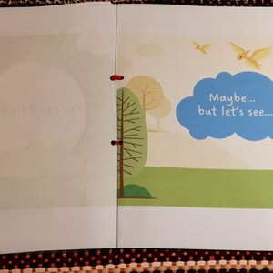 May include: An open book with a white background and a colorful illustration on the right page. The illustration features a green tree, a blue cloud with the text "Maybe... but let's see..." and two yellow birds flying in the sky.