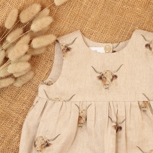 Highland Cow Linen Look Cotton Romper. Sizes 0-4 years.