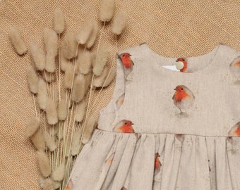 Festliches Kleid mit Rotkehlchen Print aus Baumwolle. 0-6 Jahre.