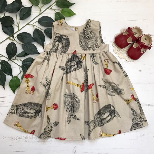 Girls pretty hare, toadstool, woodland print cotton dress. 0-6 years.