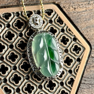 Jade leaf pendant meaning deals