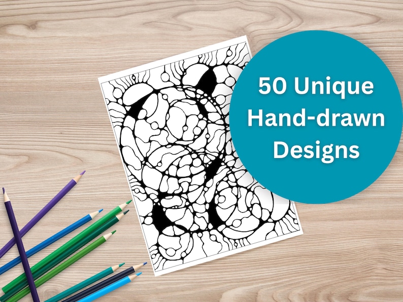 May include: A black and white abstract design on a white paper, with the text "50 Unique Hand-drawn Designs" in a teal circle. Colored pencils in blue, green, and purple are scattered on a wooden surface.