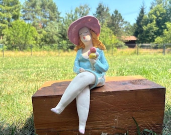 turquoise pottery sculpure of a woman, ceramic sculpture, handmade sculpture, ceramic art, woman withice cream