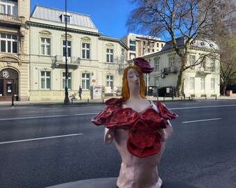 Woman in garden, ceramic sculpture