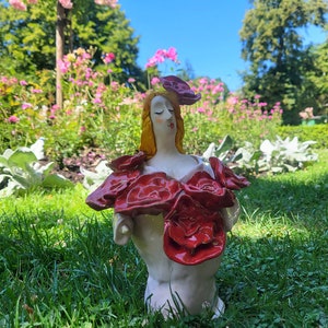 woman with flowers, handmade ceramic sculpture