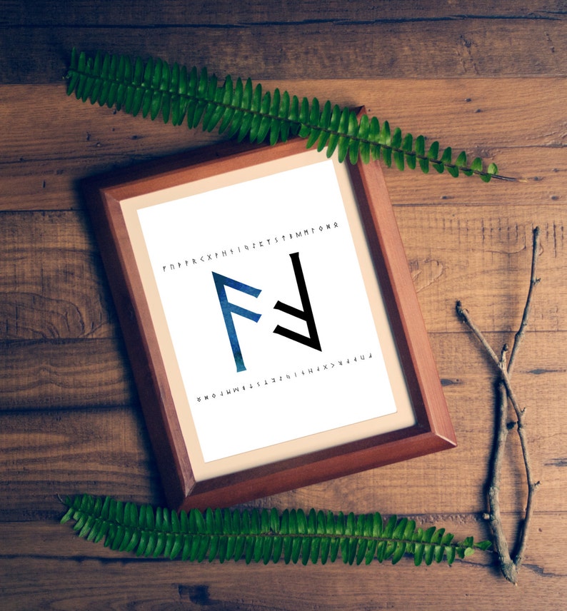 May include: A framed print of the Futhark rune "Fehu" in a blue and black watercolor style. The rune is surrounded by the Futhark alphabet in black text.