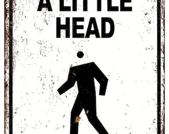 A Little Head Never Hurt Metal Sign - 8x12 Inch