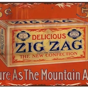 May include: Vintage metal sign with an orange background and a central box design. The box reads "Delicious Zig Zag The New Confection" with "Molasses Pop Corn Nut Confection" and "Modern D.L.C. Confections" text. The sign also features the text "Pure As The Mountain Air".