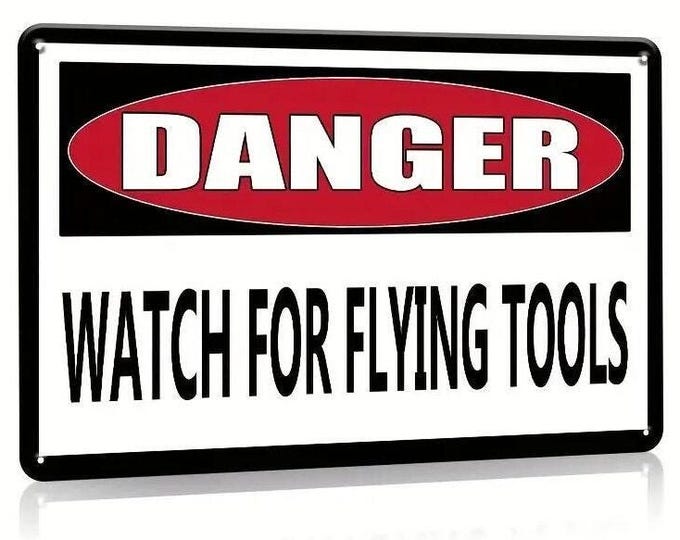 Danger - watch for flying tools gas station tin sign - 8x12 inch