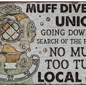 May include: A vintage-style metal sign with a diver's helmet illustration and text. The sign reads "MUFF DIVERS UNION" and "GOING DOWN IN SEARCH OF THE PEARL." The sign also includes "NO MUFF TOO TUFF LOCAL 69."
