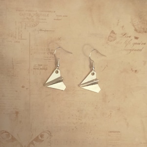 Paper plane earrings with silver plated hooks. Origami plane.