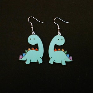 Rainbow dinosaur acrylic earrings with silver plated hooks. Gay. Pride. Dinosaur. LGBTQ. LGBTQ+.