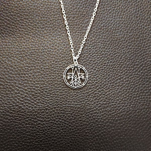 Astaroth sigil. Lesser key of Solomon. Ars Goetic Goetia demon sceal seal symbol stainless steel pendant on a silver plated 18 inch  chain.