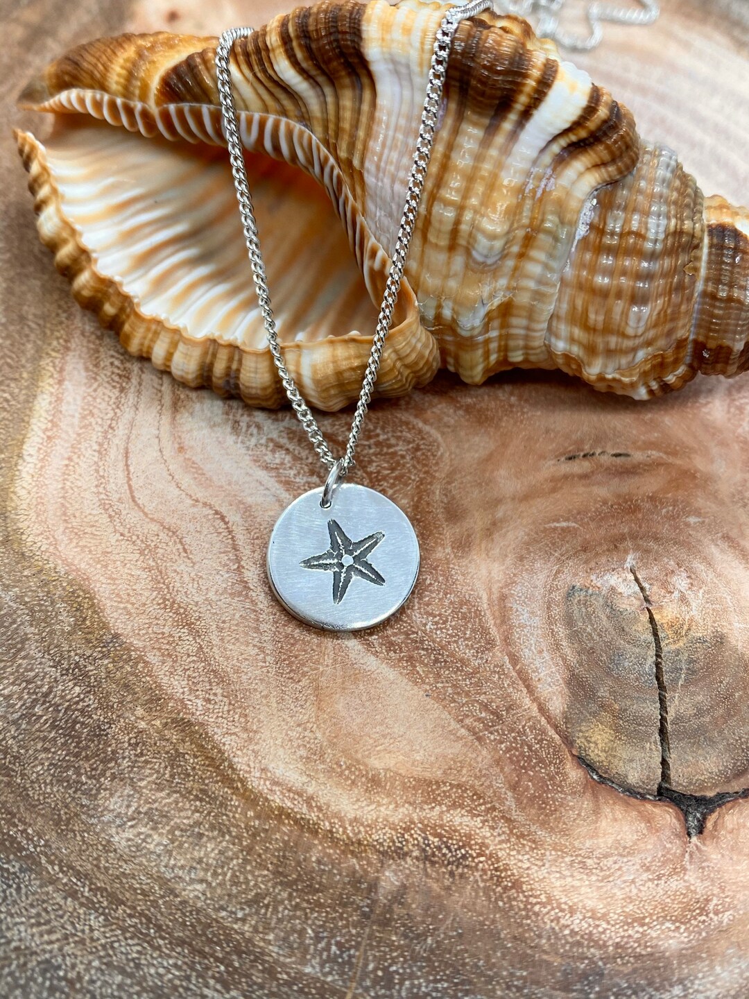 Pendentif étoile de mer opaline bleu 