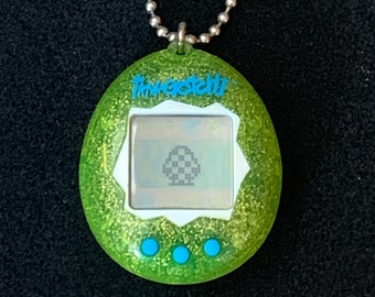 Tamagotchi Electronic Game Bandai RARE  Green Glitter Keychain. No Manual/Box