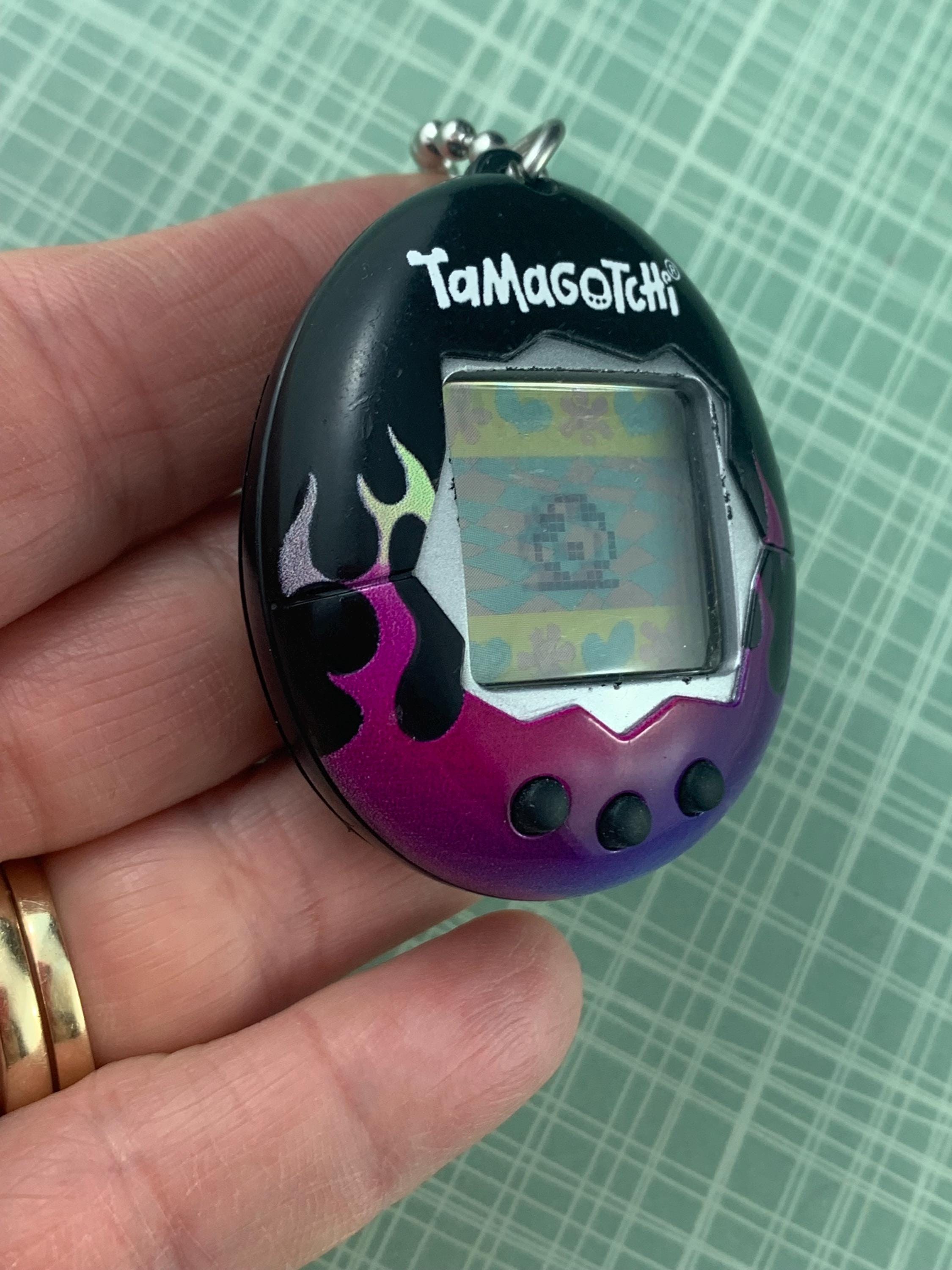 Bandai Tamagotchi Black With Dark Purple and Pink Flames