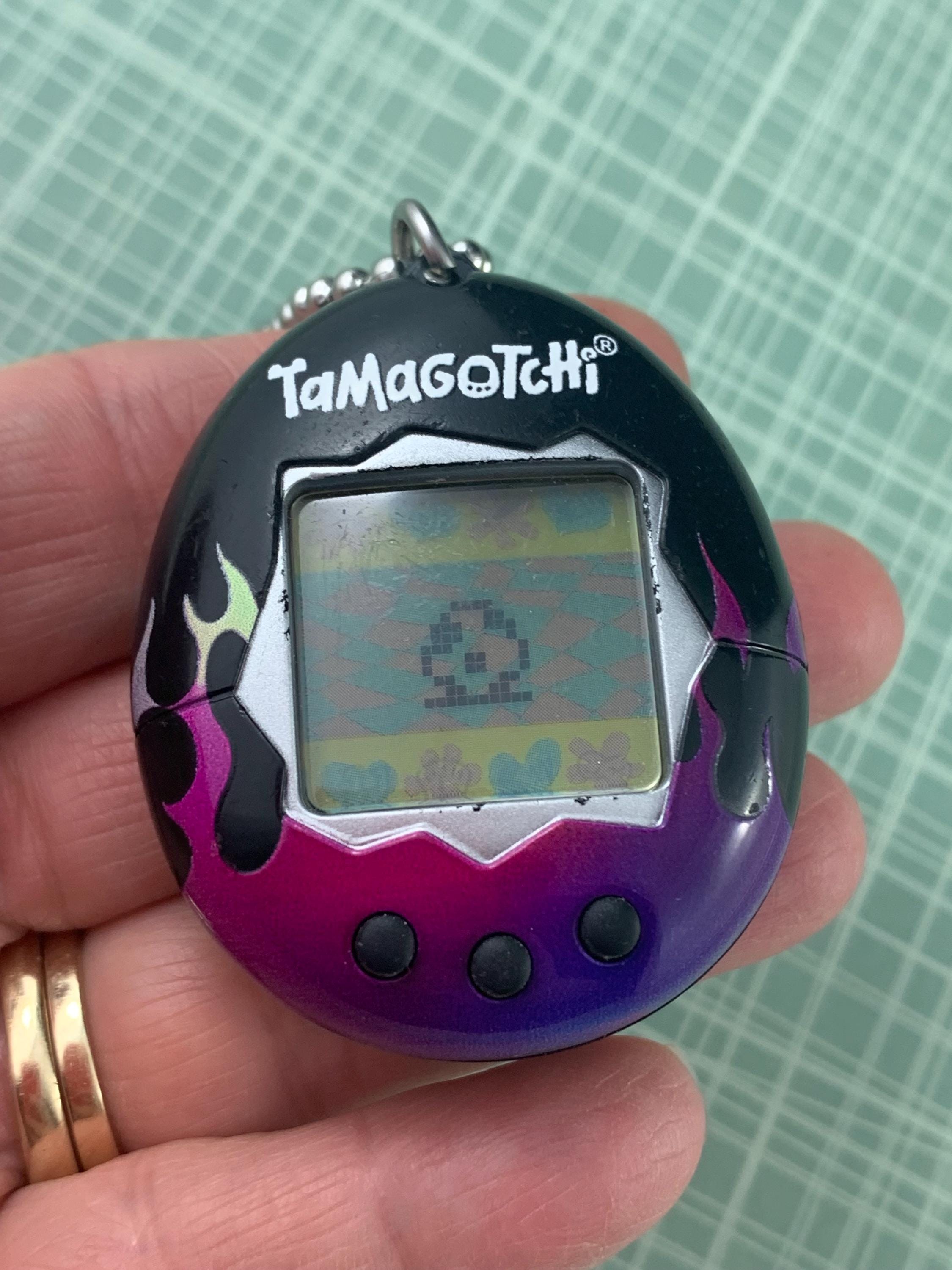 Bandai Tamagotchi Black With Dark Purple and Pink Flames